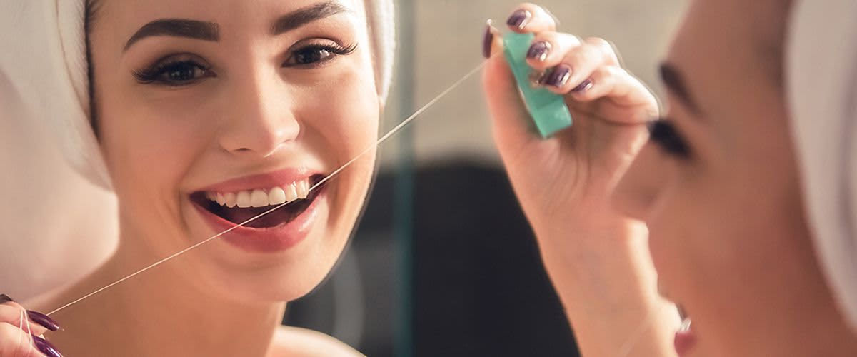 Как правилно да използвате конец за зъби