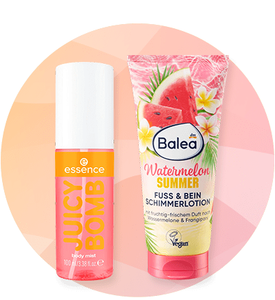 Krema Watermelon Summer i sprej Juicy Bomb na ružičastoj pozadini