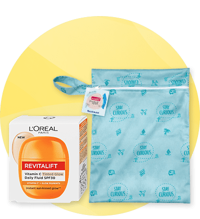 Kozmetika pakovanje L'Oréal Revitalift kreme uz plavu torbicu sa natpisom stay curious