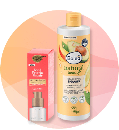 Dva proizvoda za njega kose boca regeneratora i kutija seruma na šarenoj pozadini