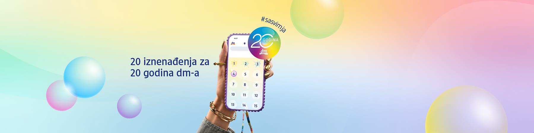 20 iznenađenja za 20 godina dm-a prikaz na mobitelu u ženskoj ruci