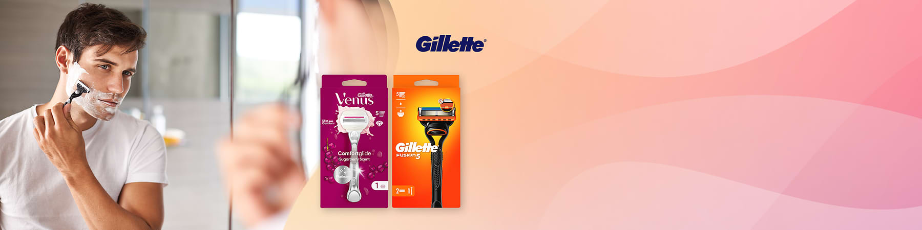 Muškarac se brije uz pakovanje Gillette Venus i Gillette Fusion5 britve