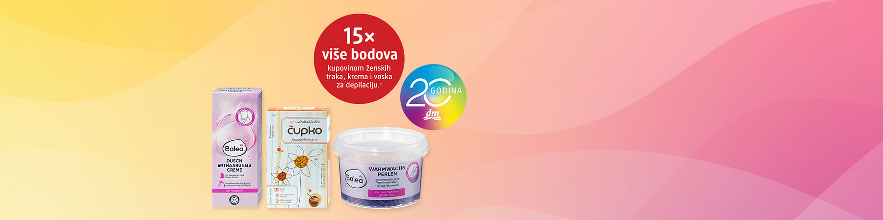 Depilacija proizvodi Balea kutija traka, krema i posuda voska na rozoj pozadini