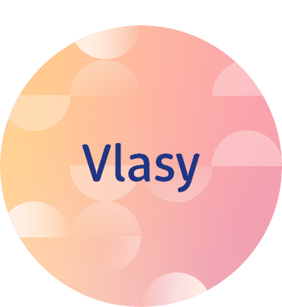 Barevný kruh s gradientem od oranžové po růžovou, text Vlasy uprostřed.