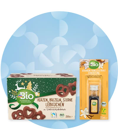 Bio perníčky a vanilkový extrakt na modrém pozadí