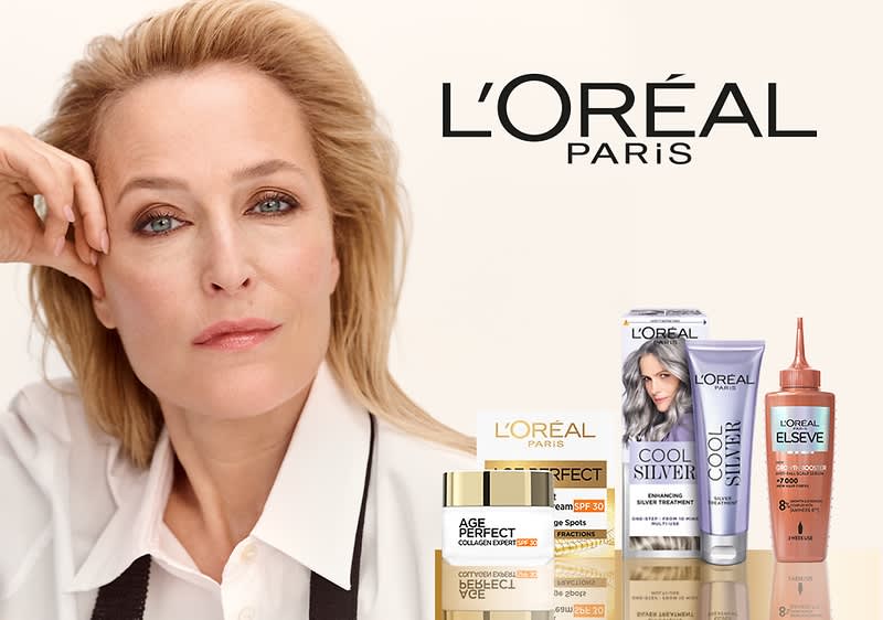 Kosmetické produkty L'Oréal Paris, včetně krémů a šamponů, vedle rozmazané tváře ženy