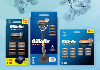 Gillette ProGlide holicí strojky a náhradní břity na modrém pozadí s květinami
