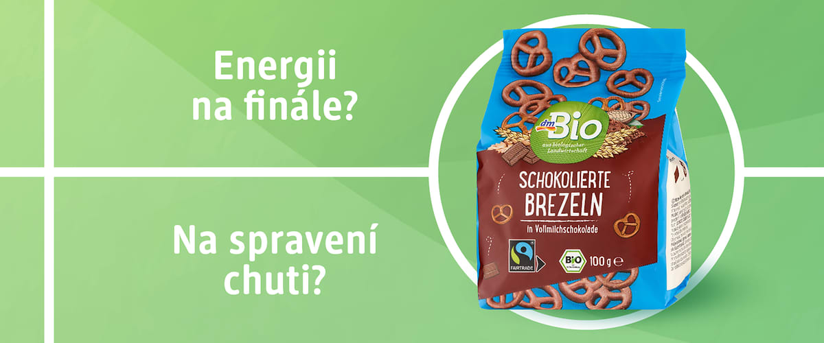 Balíček Bio čokoládových preclíků na zeleném pozadí s nápisy Energií na finále a Na spravení chuti