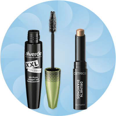 Make-up-Produkte: Foundation und Lippenstift auf rosa Hintergrund