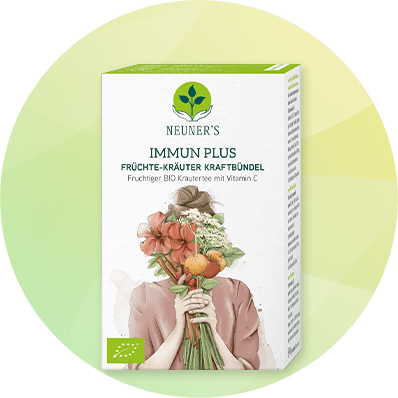 Kräutertee Verpackung mit Blumenstrauß und Vitamin C Hinweis