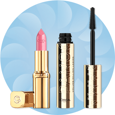 Ein rosaner Lippenstift und eine Mascara auf blauem Hintergrund