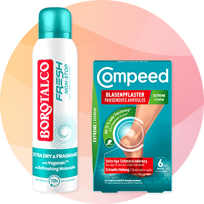 Eine weiße Sprühdose Borotalco Fresh mit türkisfarbenem Deckel und rotem Logo neben einer grünen Compeed-Blasenpflaster-Packung mit Abbildung eines Fußes und der Aufschrift „Blasenpflaster“ und „6 Pflaster“