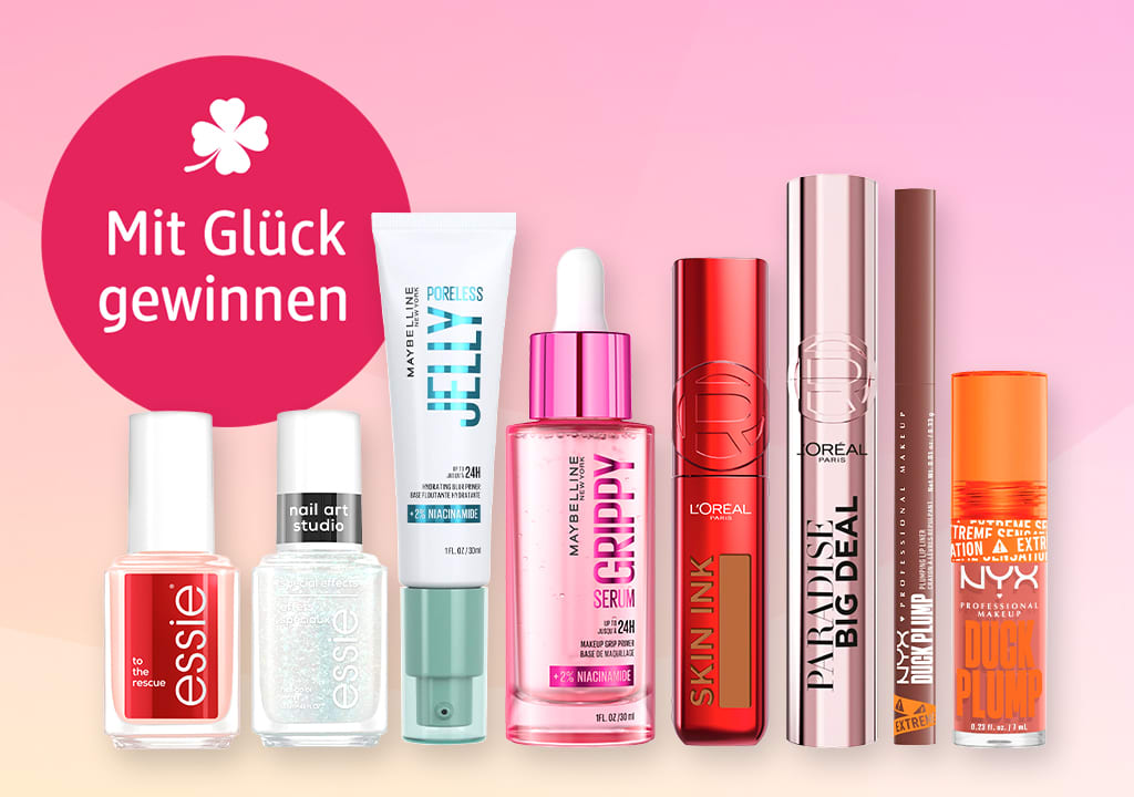 Kosmetikprodukte vor rosa Hintergrund