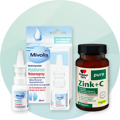 Zwei Produktverpackungen: Mivolis Hyaluron Nasenspray mit blauer Schrift und Doppelherz Zink+C mit grüner Schrift