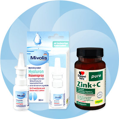 Eine Verpackung von Mivolis Hyaluron Nasenspray und eine Flasche Doppelherz Zink+C