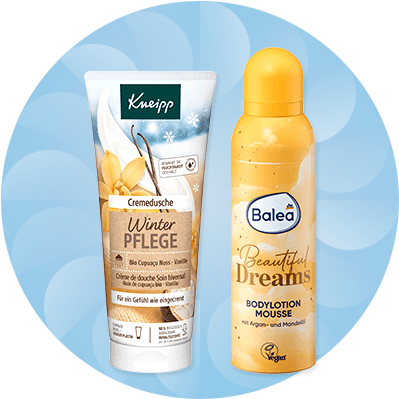 Eine Kneipp Cremedusche mit Vanille und Winterpflege-Aufschrift neben einer Balea Bodylotion Mousse mit Argan und Mandelöl