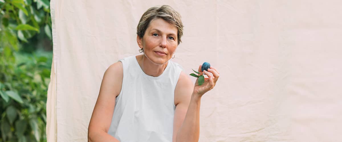 Frau mit Frucht