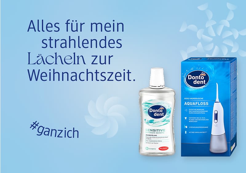 Eine blaue Verpackung der Dontodent Aquafloss neben einer Dontodent Sensitive Mundspülung. Text: „Alles für mein strahlendes Lächeln zur Weihnachtszeit“ und „#ganzich“