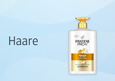 Pantene Pro-V Haarpflege Spülung Flasche auf blauem Hintergrund