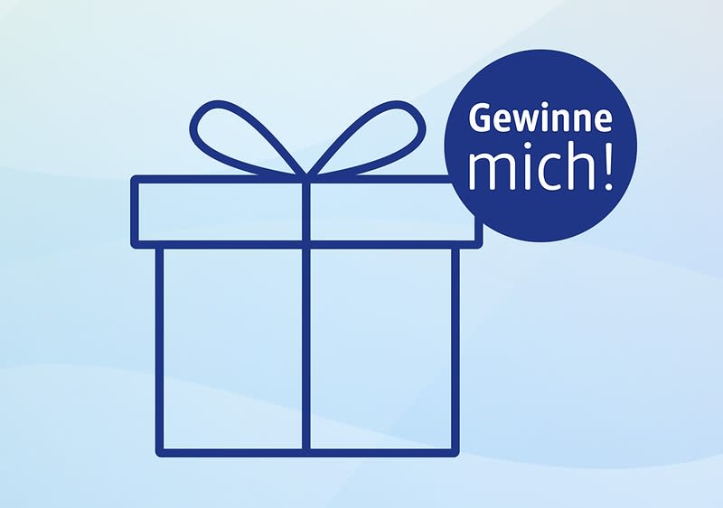 Eine blaue Geschenkbox mit Schleife und einem Kreis mit der Aufschrift „Gewinne mich!“ auf hellem Hintergrund