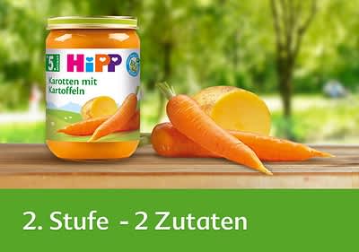 Hipp Babynahrung Karotten mit Kartoffeln im Glas mit frischen Karotten und Kartoffeln