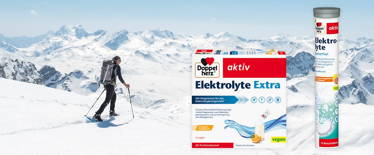 Zwei Produktverpackungen von Doppelherz: links eine Packung mit der Aufschrift „Elektrolyte Extra“, rechts eine Tube mit „Elektrolyte Zuckerfrei“