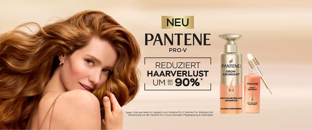 Eine Produktwerbung für Pantene Pro-V Shampoo mit der Aufschrift „Reduziert Haarverlust um bis zu 90 %“. Im Hintergrund ist eine Frau mit voluminösem, rotem Haar.