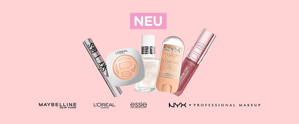 Auf rosafarbenem Hintergrund fünf Kosmetikprodukte nebeneinander: silberne Mascara, kompakte Puder-Dose mit Logo „L'Oréal“, weiße Nagellack-Flasche, beige NYX-Stick mit buntem Schriftzug und roséfarbener Lippenstift-Stift, oben mittig rosa Schild mit weißer Aufschrift „NEU“