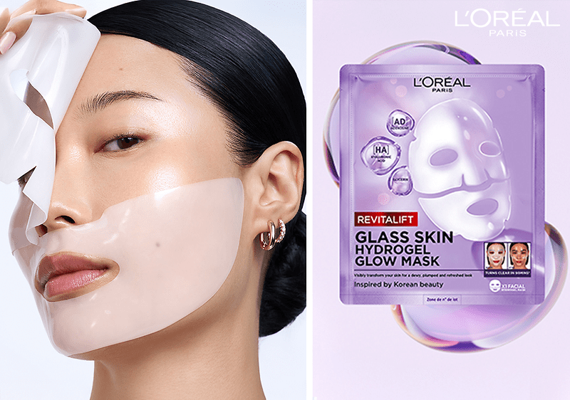 Links halbnahes Porträt einer Frau mit zurückgestecktem dunklem Haar und goldenen Creolen, rechts Verpackung einer lila L’Oréal Revitalift Glass Skin Hydrogel Glow Mask mit Produktname und kleinem Vorher-nachher-Bild