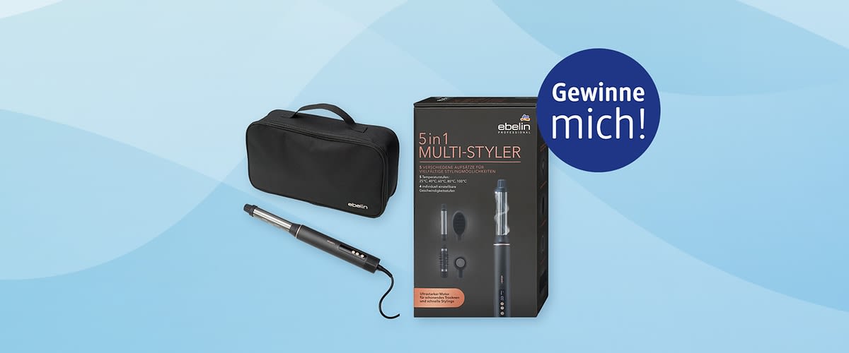 Schwarzer 5‑in‑1 Multi‑Styler von ebelin mit ergonomischem Griff, drei Aufsätzen, schwarzer Reisetasche und schwarzer Verpackung mit Aufschrift „5in1 MULTI‑TYLER“ und rundem blauer Aufkleber „Gewinne mich!“