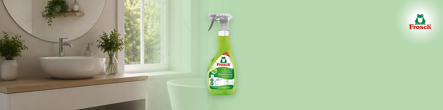 Grüner Frosch-Markenreiniger mit Sprühflasche links und rechts eine Zeichnung eines grünen Frosches in gepunkteten Badehosen, der mit Seife an einem Waschbecken Hände wäscht, Markenlogo oben rechts