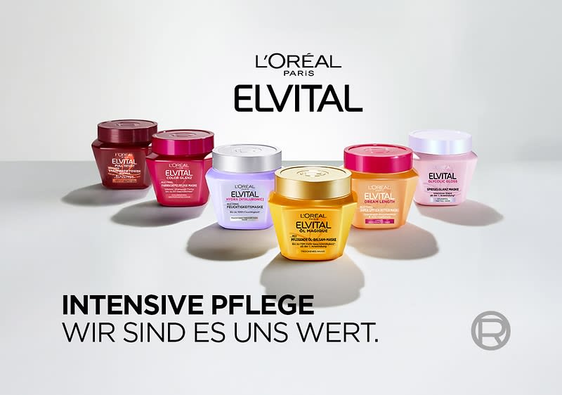 Sechs bunte Elvital-Haarpflege-Tiegel von L’Oréal Paris in zwei Reihen auf hellem Untergrund, Markenname „L’ORÉAL PARIS ELVITAL“ oben und Slogan „INTENSIVE PFLEGE WIR SIND ES UNS WERT“ links unten ohne Punkt