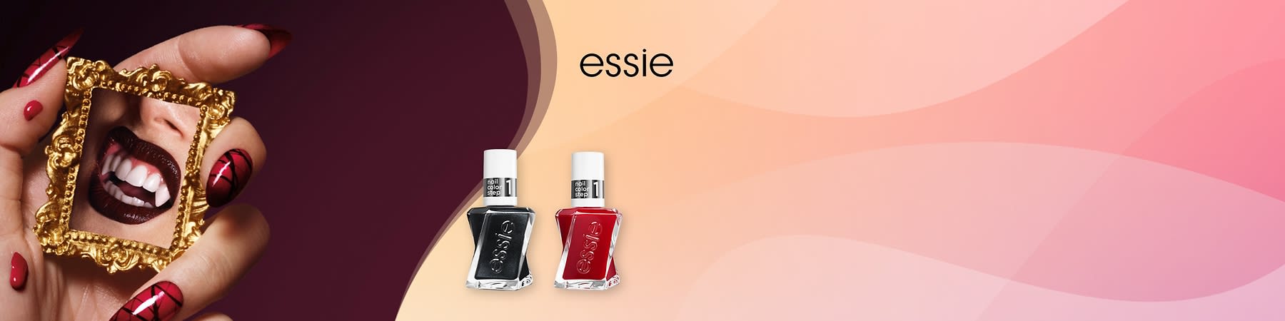 Hand mit roten, schwarzen gemusterten Fingernägeln hält einen kleinen goldenen Rahmen, im Rahmen sichtbar Mund mit dunklem Lippenstift und weißen Zähnen; daneben zwei Essie-Nagellackflaschen in Schwarz und Rot auf rosa Verlaufshintergrund, Markenname „essie“ oben rechts