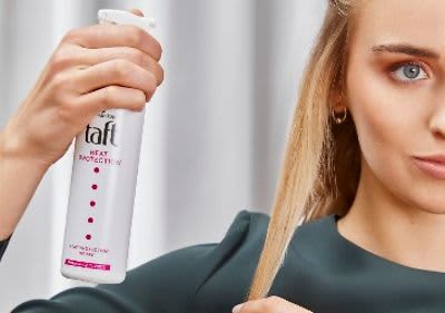 Hitzeschutz-Spray aufsprühen
