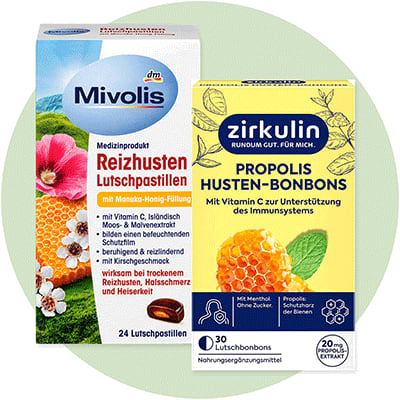 Zwei Produktverpackungen nebeneinander, links eine weiße Packung von Mivolis mit der Aufschrift „Reizhusten Lutschpastillen“ und einem Bild von Blumen und Honigwaben, rechts eine gelbe Packung von Zirkulin mit der Aufschrift „Propolis Husten-Bonbons“ und einem Bild von Honigwaben und Blättern