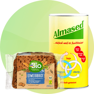 Eine Packung dmBio Eiweißbrot neben einer Dose Almased mit der Aufschrift „einfach weil es funktioniert“