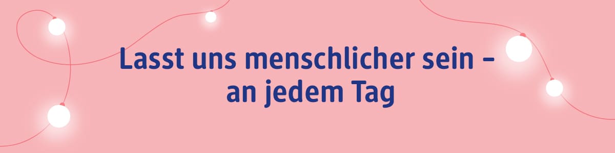 Rosa Hintergrund mit dem dunkelblauen Text „Lasst uns menschlicher sein - an jedem Tag“
