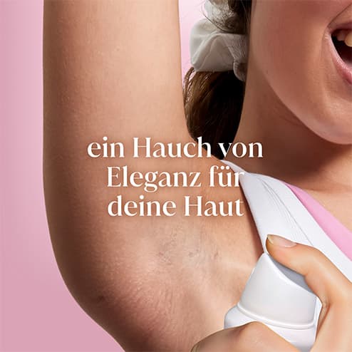 Eine Frau hebt ihren Arm, um ihre Achsel zu zeigen, daneben der Text „ein Hauch von Eleganz für deine Haut“