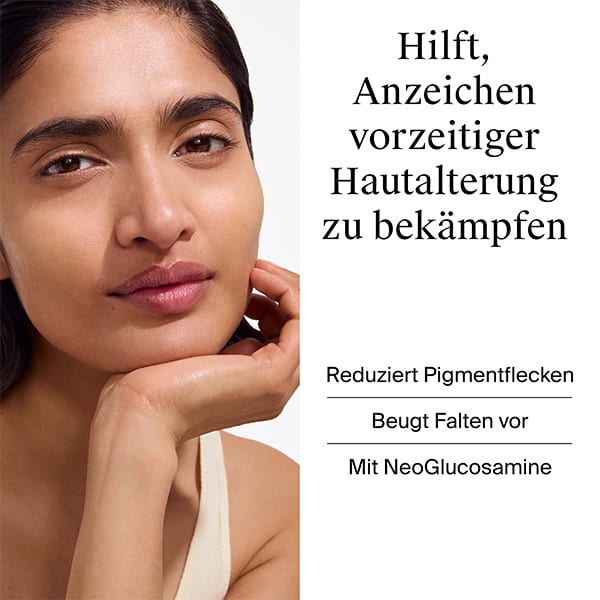 Ein Werbebild für ein Hautpflegeprodukt mit den Texten: „Anzeichen vorzeitiger Hautalterung zu bekämpfen“, „Reduziert Pigmentflecken“, „Beugt Falten vor“, „Mit NeoGlucosamine“. Eine Person hält ihre Hand an das Gesicht.