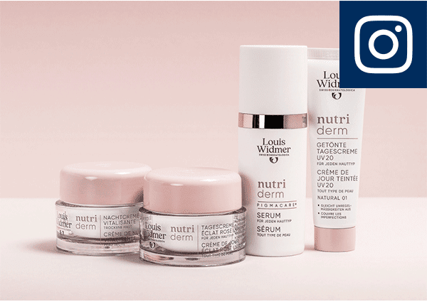Drei kleine runde Tiegel und zwei zylindrische Spender der Marke Louis Widmer aus der Pflegeserie nutri derm, Beschriftungen unter anderem NACHTCREME, TAGESCREME und SERUM, Verpackungen in Pastellrosa und Weiß mit goldfarbener Schmuckkante