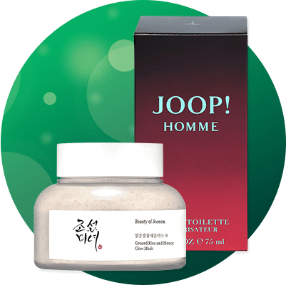 Gläserner Tiegel mit weißem Schraubdeckel und weißem Etikett „Beauty of Joseon“ neben rotem Karton mit Aufschrift „JOOP! HOMME“ und Angabe „75 ml“ vor grünem Kreis-Hintergrund