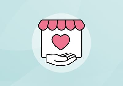 Markt mit einem Herz in der Mitte, darunter eine Hand