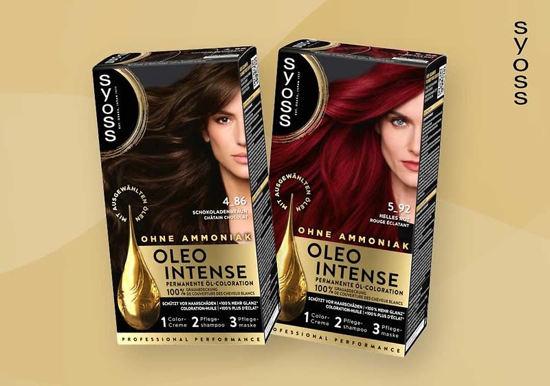 Zwei Syoss Oleo Intense Haarfärbemittelpackungen nebeneinander, links Farbe 4‑86 schokoladenbraun mit Bild einer dunkelbraunen Frau, rechts Farbe 5‑92 rubinrot mit Bild einer rothaarigen Frau, auf Vorderseiten Aufschriften „OHNE AMMONIAK“ und „OLEO INTENSE“ und goldene Tropfen-Grafik