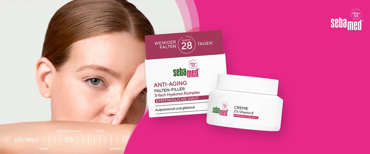 Zwei weiße Cremedosen mit grüner und roter Aufschrift auf einem pinken Hintergrund, die linke Dose ist mit dem Text sebamed Creme mit 2% Vitamin E und einem grünen Logo mit der Aufschrift Erhält das Mikrobiom versehen, die rechte Dose trägt den Text sebamed Trockene Haut Gesichtscreme Urea Akut 5% sowie ein rotes Logo mit der Aufschrift 5% Urea, oben rechts befindet sich das sebamed-Logo in Weiß
