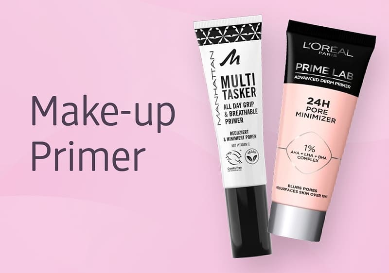 Zwei Make-up-Primer-Tuben auf rosa Hintergrund.