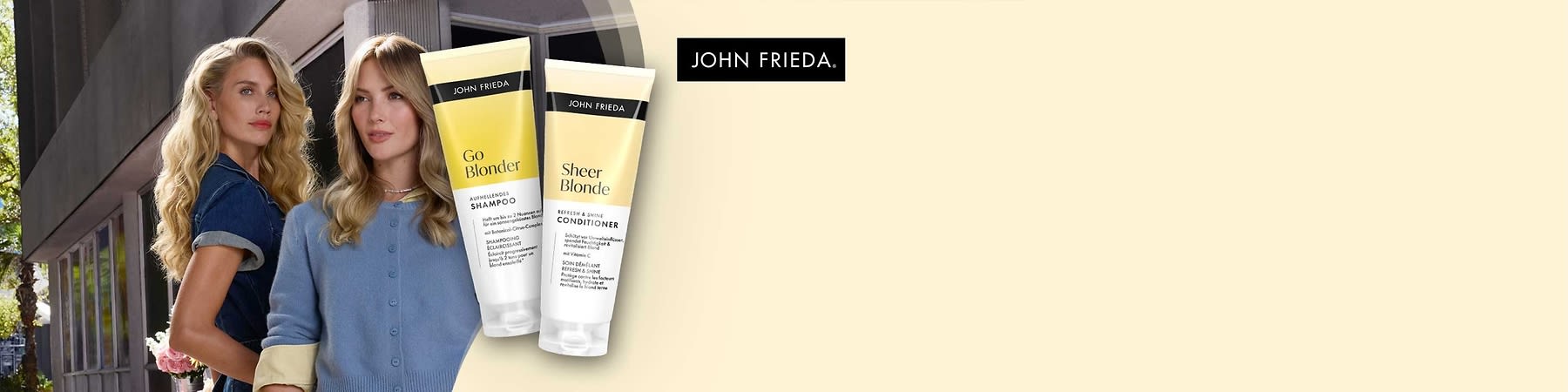 Zwei gelb-weiße Tuben von John Frieda, links „Go Blonder Aufhellendes Shampoo“, rechts „Sheer Blonde Refine & Shine Conditioner“
