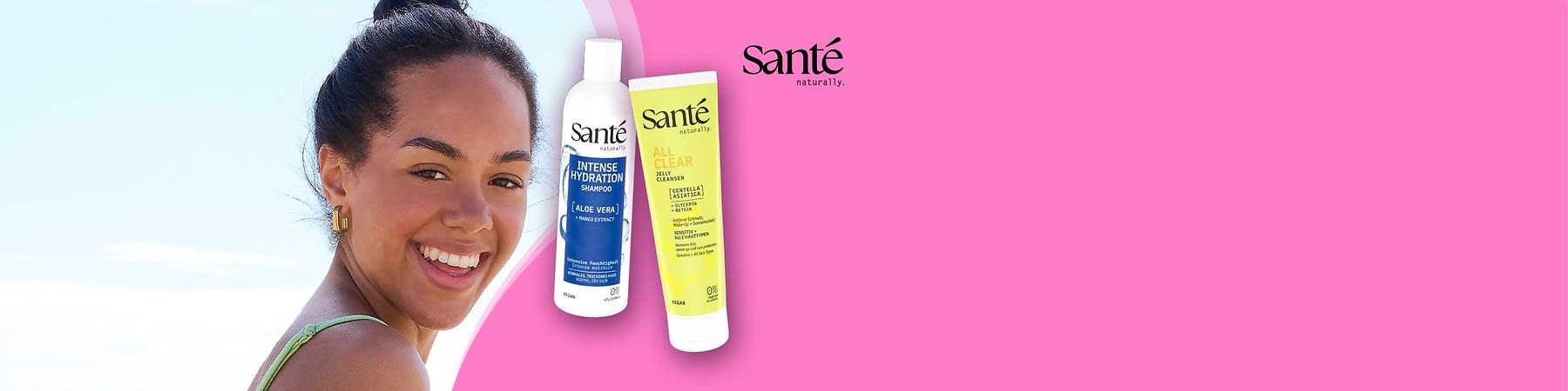 Zwei Sante-Produkte vor rosa Hintergrund: links weiße Flasche „Intense Hydration Shampoo (Aloe Vera)“, rechts gelbe Tube „All Clear Jelly Cleanser“ mit Sante‑Logo oben rechts