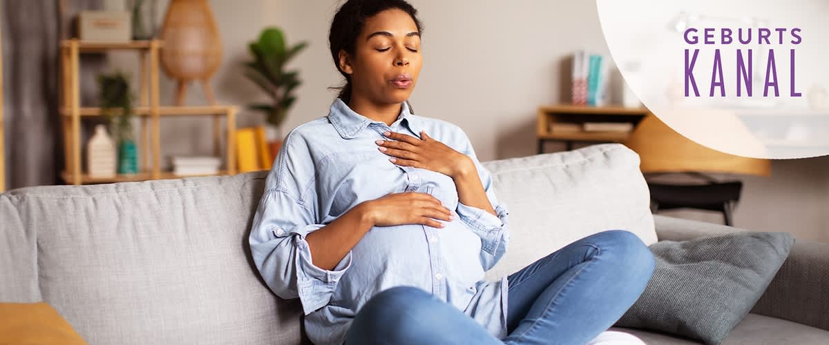 Schwangere Frau macht Atemsübungen