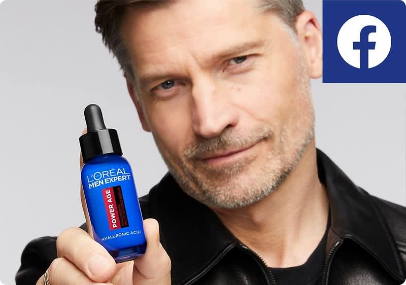 Mann hält L'Oréal Men Expert Serum