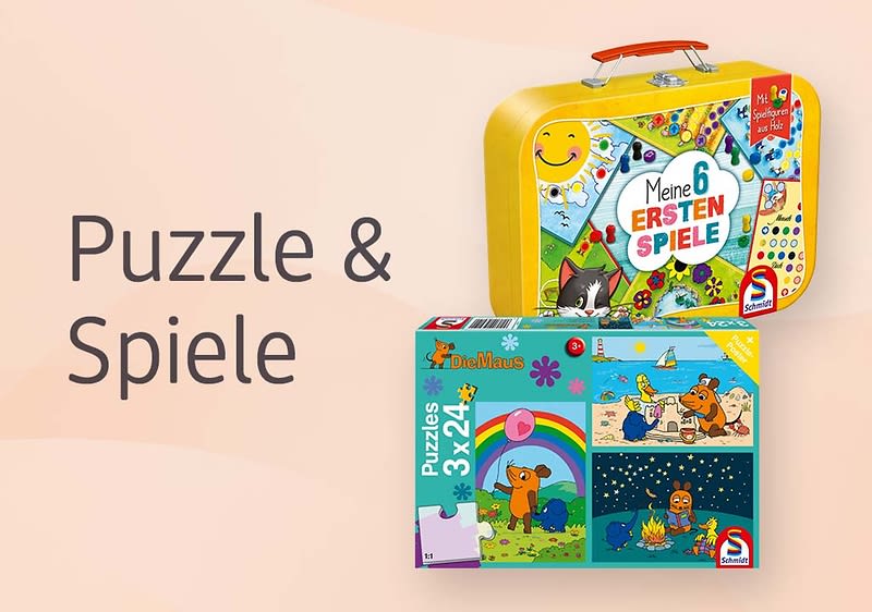 Zwei Spieleboxen mit Puzzles